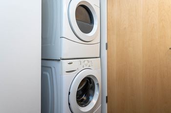 Central eastside lofts | #317 bathroom with stackable washer and dryer